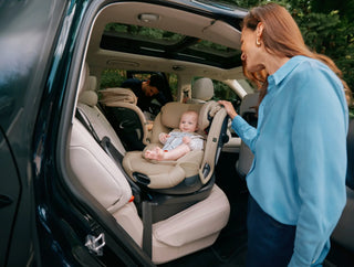 Beige infant car seat with adjustable harness and padded headrest in car seats austin georgetown round rock collection