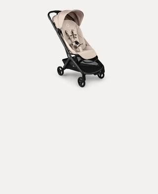 Beige and black bugaboo bee3 stroller with a sleek, modern design.