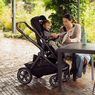 Nuna DEMI Next with Travel Board + PIPA Urbn Travel System Caviar - 26